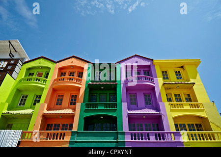 Colorful building. Brightly colored apartments in the course of renovation. Thailand Asia. Stock Photo
