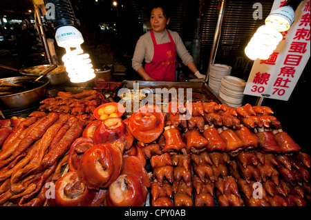 Taiwan, Taipei, Snake Alley District, night market, pork stand Stock Photo