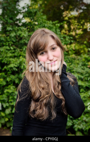 https://l450v.alamy.com/450v/cpy0gj/portrait-of-beautiful-young-woman-teenager-with-long-blond-hair-brown-eyes-serious-thoughtful-expression-outdoors-cpy0gj.jpg