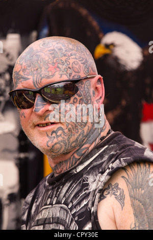 Portrait of a tattooed biker. Stock Photo