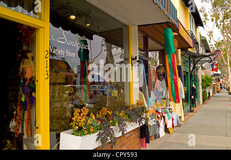 Shops and restaurants line Marine Avenue, the main shopping street that is only two blocks long on quaint Balboa Island in Newport Beach, California. Stock Photo