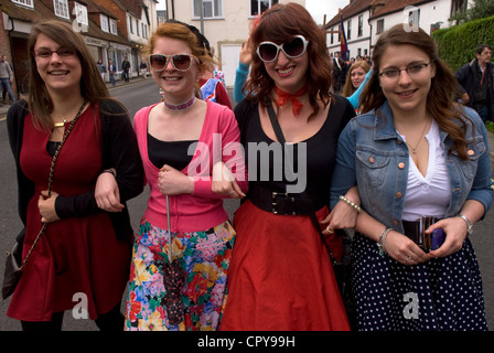 Four female friends, middle 2 in 1950s garb, at the Queen's Diamond Jubilee celebrations, Petersfield, Hampshire, UK. Stock Photo