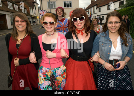Four female friends, middle two in 1950s attire, at the Queen's Diamond Jubilee celebrations Stock Photo