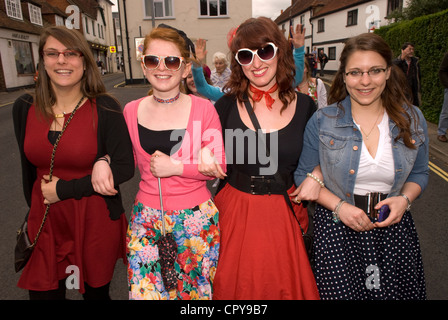 Four female friends, middle two in 1950s attire, at the Queen's Diamond Jubilee celebrations Stock Photo