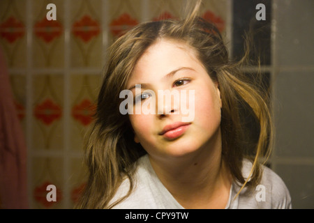 Girl aged 11 12 portrait face hair wind Stock Photo