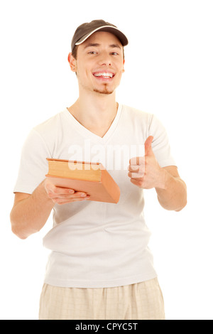 Casual young smiling men shows gesture that this book is very nice. On white background. Stock Photo