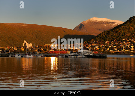 Norway, Troms County, Tromso, the Arctic Cathedral and Tromsdalstind Mount (1238 m) in the background Stock Photo