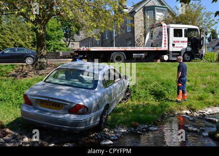 Jaguar X-type left the road in Dollar, Scotland, and drove into the river Dollar Burn on hot Sunday May 27th 2012. Stock Photo