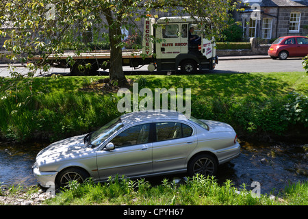 Jaguar X-type left the road in Dollar, Scotland, and drove into the river Dollar Burn on hot Sunday May 27th 2012. Stock Photo