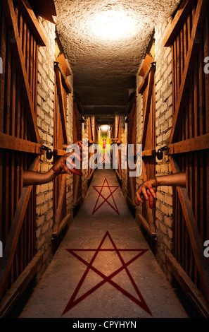 Way to hell in dark basement concept of dark vision with devil sign and pentagram Stock Photo