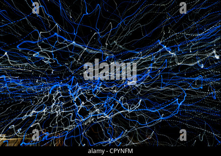 Blue and white light trails Stock Photo