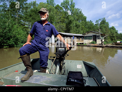 United States, Louisiana, Atchafalaya Basin, Norbert Leblanc and his boat in the bayous