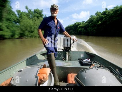 United States, Louisiana, Atchafalaya Basin, Norbert Leblanc and his boat in the bayous