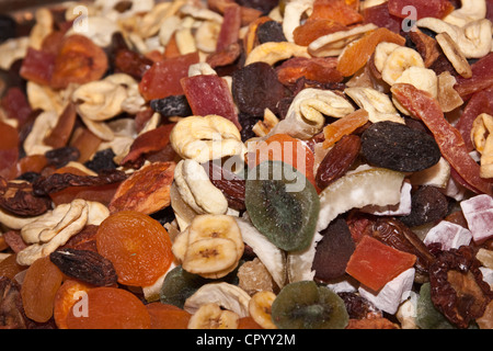 Dried fruit, kiwi, apricot, banana, papaya, dates, ginger, plums, apples Stock Photo