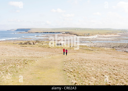 The brough of Birsay on the Orkney with tourists Stock Photo