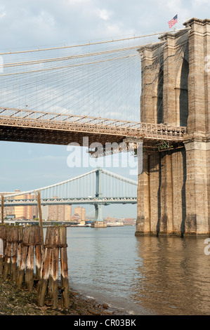 View from Manhattan towards the Brooklyn Bridge with the Manhattan Bridge the rear, suspension bridges, Two Bridges District Stock Photo