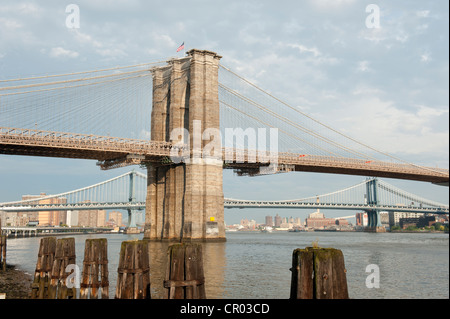 View from Manhattan towards the Brooklyn Bridge with the Manhattan Bridge the rear, suspension bridges, Two Bridges District Stock Photo