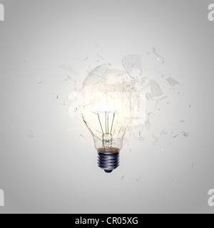 Close up of light bulb shattering Stock Photo