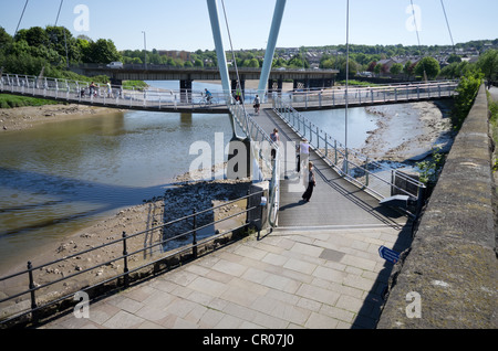 Millennium pedestrian and cycle Bridge Lancaster over the River Lune with the Grey Hound bridge beyond in the back ground Stock Photo