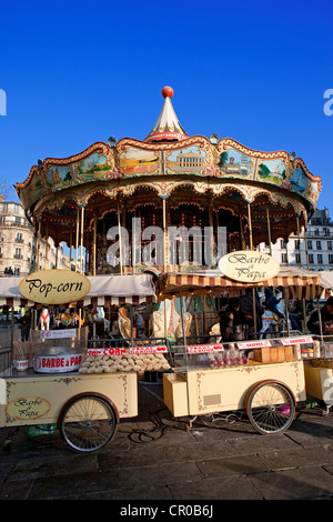 France, Paris , merry-go-round in Place de l'Hotel de Ville Stock Photo