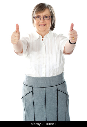 Woman executive showing double thumbs-up isolated on white Stock Photo