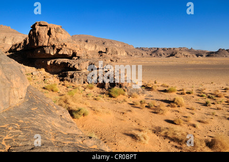 Sandstone rock formation and Oeud, Wadi on Tasset Plateau, Tassili n'Ajjer National Park, Unesco World Heritage Site Stock Photo