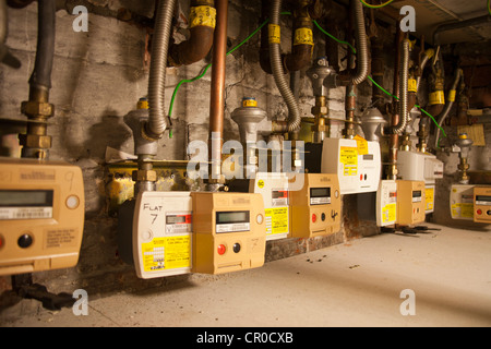 A gas meter arrangement in a multi-occupancy property  Energy Monitoring Stock Photo