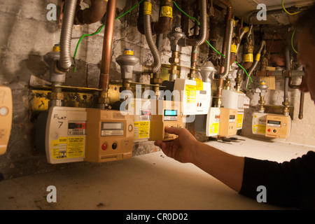 A gas meter arrangement in a multi-occupancy property  Energy Monitoring Stock Photo