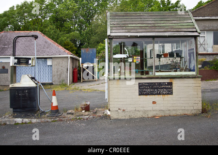 Disused closed-down petrol station and garage in west Wales. Stock Photo