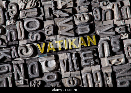 Old lead letters forming the word Vatikan, German for Vatican Stock Photo
