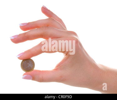 Female hand with one euro coin isolated on white background Stock Photo