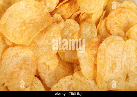 Potato chips colorful abstract background Stock Photo