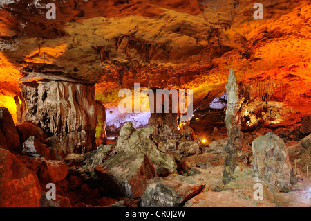 Colourfully, illuminated Hang Sung Sot cave, Surprise Cave, Cave of Awe, a UNESCO World Heritage Site Stock Photo
