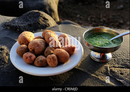 Traditional Canarian wrinkly potatoes, papas arrugadas with mojo verde, tapas, La Palma, Canary Islands, Spain, Europe Stock Photo