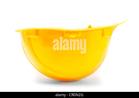Yellow hard hat, protective equipment in construction industry. Stock Photo