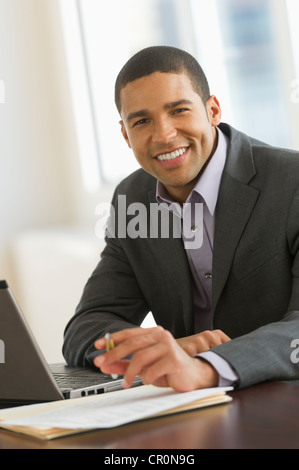 USA, New Jersey, Jersey City, Portrait of businessman smiling Stock Photo