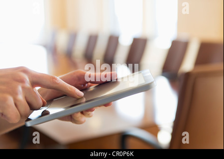 USA, New York, New York City, Hands of businesswoman using tablet pc Stock Photo