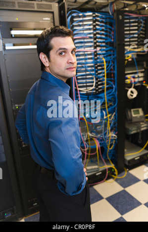 USA, New York, New York City, Portrait of male IT support technician Stock Photo