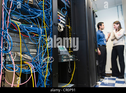 USA, New York, New York City, IT support technicians in server room Stock Photo