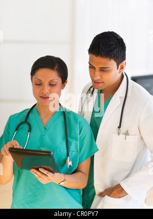 USA, New Jersey, Jersey City, Doctors using digital tablet Stock Photo