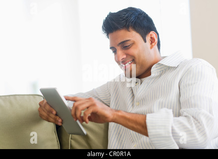 USA, New Jersey, Jersey City, Man using digital tablet Stock Photo