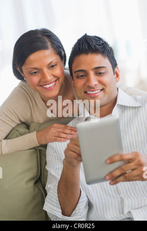 USA, New Jersey, Jersey City, Couple using digital tablet Stock Photo