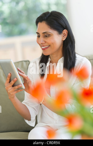 USA, New Jersey, Jersey City, Woman using digital tablet Stock Photo