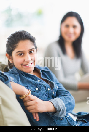USA, New Jersey, Jersey City, Portrait of girl (12-13), mother in background Stock Photo