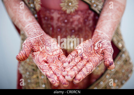 Caucasian woman with Indian henna tattoos on her hands Stock Photo