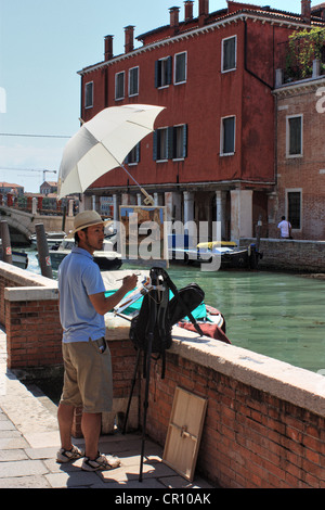 Painter in Venice, Italy Stock Photo