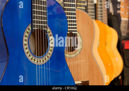 guitars in the store abstract background blur Stock Photo