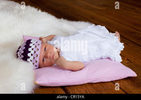 Newborn baby girl, two weeks old Stock Photo