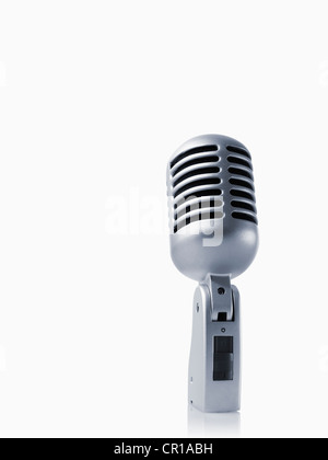 Studio shot of vintage-themed modern microphone on white background Stock Photo