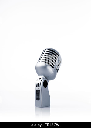 Studio shot of vintage-themed modern microphone on white background Stock Photo